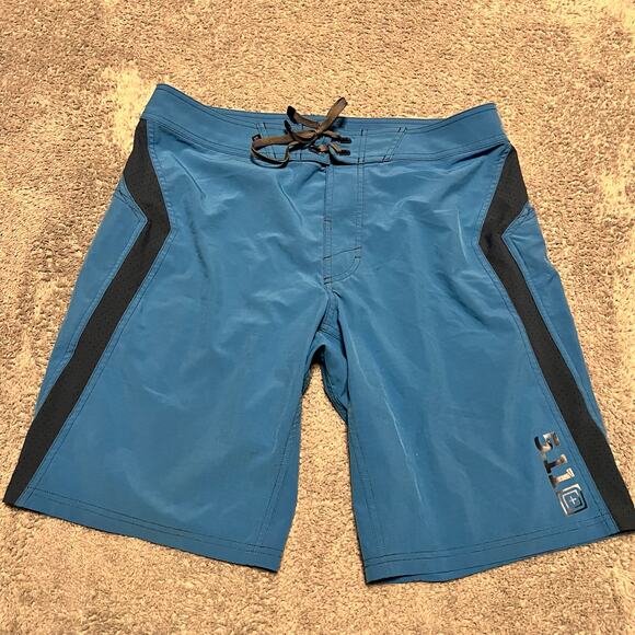 5.11 Tactical Shorts Mens 34 Board Shorts Beach Swim Trunks Unlined Stretch Blue - Picture 1 of 10